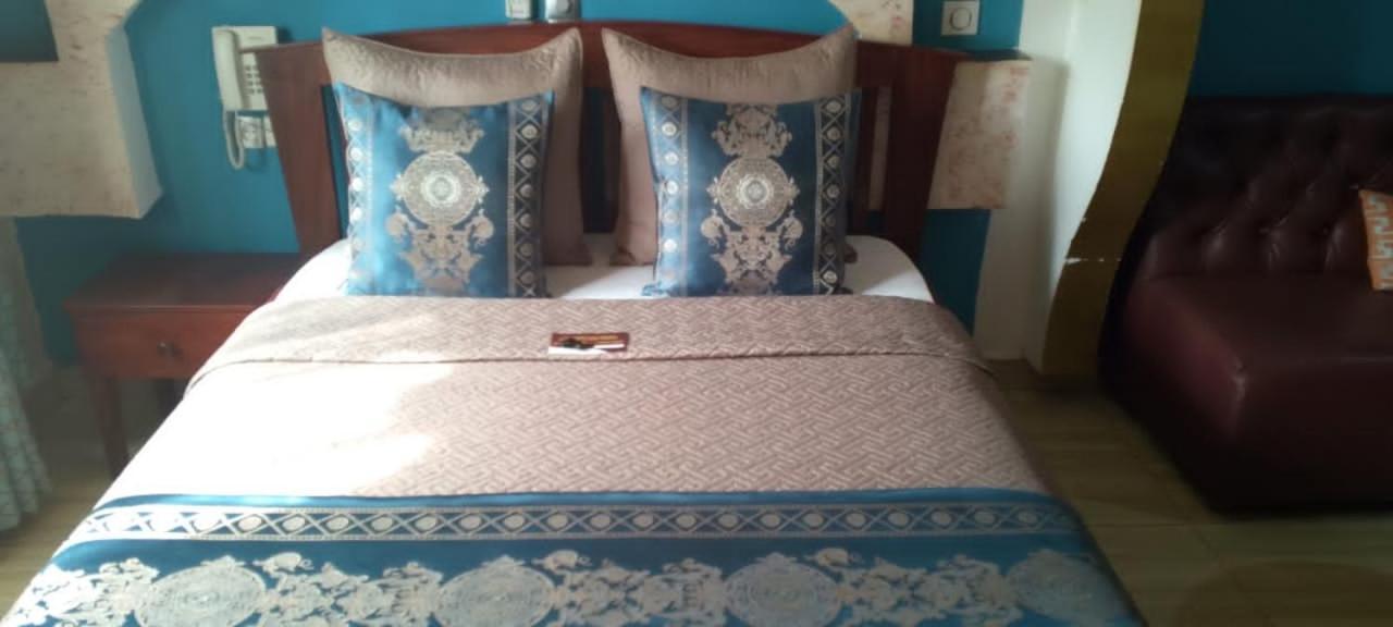 Hotel Restaurant Constellation Tchang Стая снимка